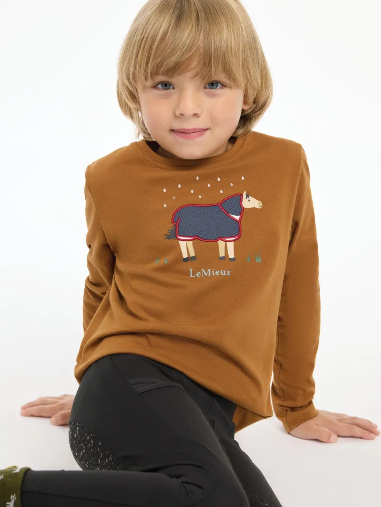 lemieux-kids-mini-jessie-long-NFHavRgD-0.webp Outlet HORSE HEALTH TRADE LeMieux® Kids’ Mini Jessie Long Sleeve Top